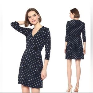 Black wrap dress with blue/white polka dots
